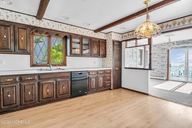 Start your summer 2026 in this prime bay front bi-level nestled - photo 22