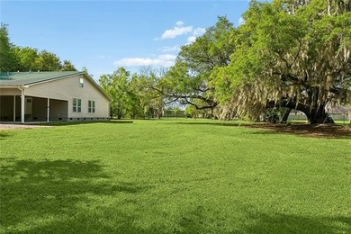 Situated on 2.09 acres off of Historic Bayou Road, one of the - photo 2