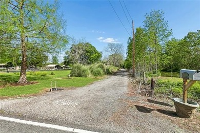 Situated on 2.09 acres off of Historic Bayou Road, one of the - photo 3