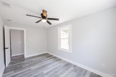 Turnkey and fully renovated! Welcome to 402 Rue Max St., a - photo 23