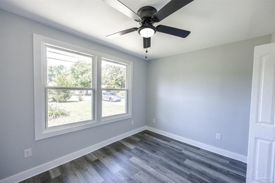 Turnkey and fully renovated! Welcome to 402 Rue Max St., a - photo 24
