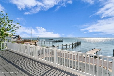 Start your summer 2026 in this prime bay front bi-level nestled - photo 34