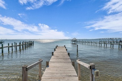 Start your summer 2026 in this prime bay front bi-level nestled - photo 35