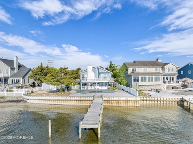 Start your summer 2026 in this prime bay front bi-level nestled - photo 37