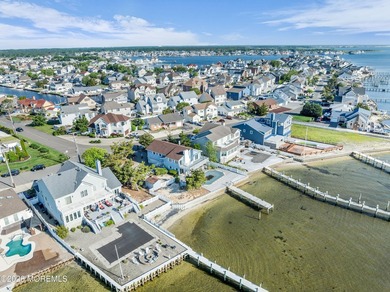 Start your summer 2026 in this prime bay front bi-level nestled - photo 41