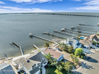 Start your summer 2026 in this prime bay front bi-level nestled - photo 43