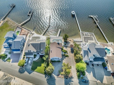 Start your summer 2026 in this prime bay front bi-level nestled - photo 47