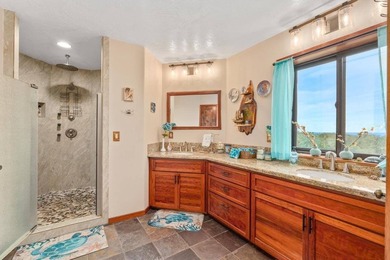 Set on 9.63 acres outside Hilo, this furnished 8-bedroom, 8-bath - photo 12
