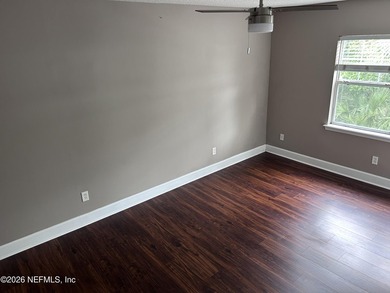 This 950-square-foot, two-bedroom, two-bath end unit sits in the - photo 6