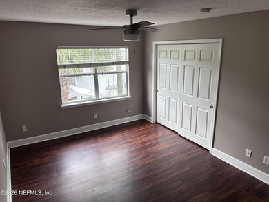 This 950-square-foot, two-bedroom, two-bath end unit sits in the - photo 7