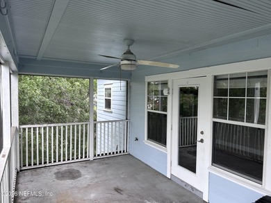 This 950-square-foot, two-bedroom, two-bath end unit sits in the - photo 8