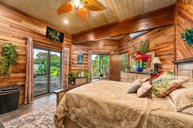 Set on 9.63 acres outside Hilo, this furnished 8-bedroom, 8-bath - photo 23