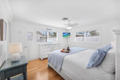 Step into this beautifully updated 3-bedroom island retreat on - photo 10