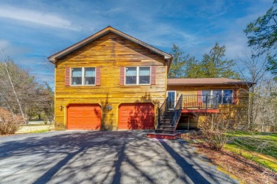 Welcome to this charming cedar split-level home nestled in the - Lake Home For Sale in Athens, New York