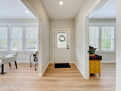 Timeless Riverside charm meets modern luxury in this beautifully - photo 2