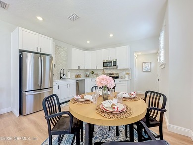 Timeless Riverside charm meets modern luxury in this beautifully - photo 7