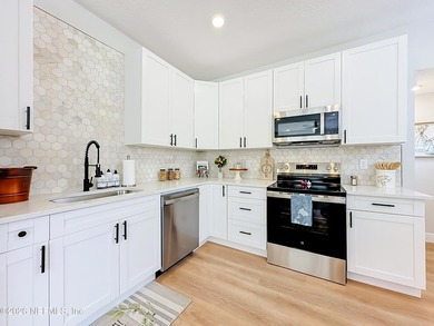 Timeless Riverside charm meets modern luxury in this beautifully - photo 9