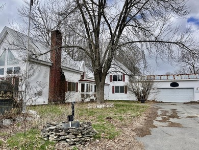 Here's a home in town Madison with lots of charm. Spacious - photo 2