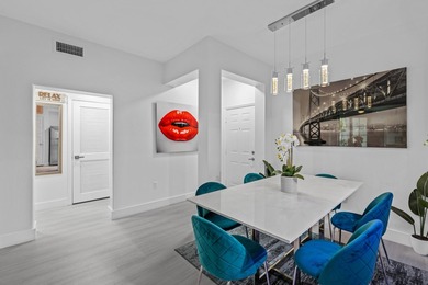 Completely renovated and move-in ready, this beautiful condo is - photo 3