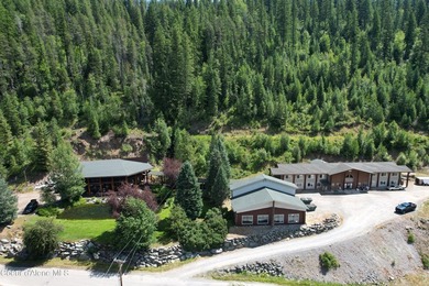 Escape to the rugged beauty of North Idaho with this exclusive - photo 11