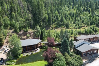 Escape to the rugged beauty of North Idaho with this exclusive - photo 12