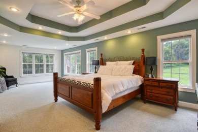 This Stately, all brick colonial is situated on over 1/2 acre