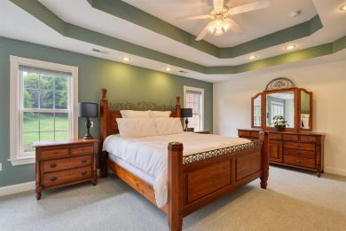 This Stately, all brick colonial is situated on over 1/2 acre