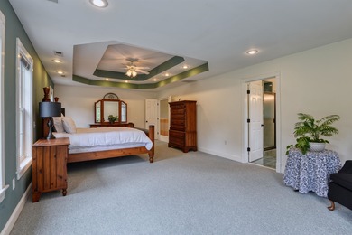 This Stately, all brick colonial is situated on over 1/2 acre