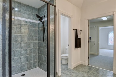 This Stately, all brick colonial is situated on over 1/2 acre