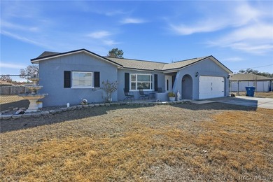 Welcome to this spacious 5-bedroom, 2-bath home set on a private - photo 5