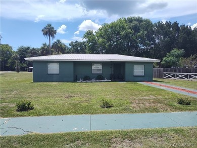Charming home in Inglis, Fl. Discover this cozy 3-bedroom - photo 1