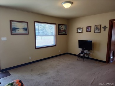 Charming home in Inglis, Fl. Discover this cozy 3-bedroom - photo 3