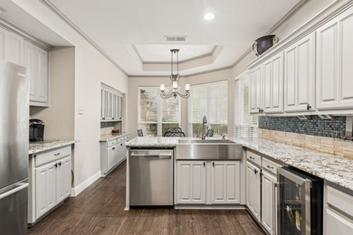 Beautifully situated on a heavily treed one-acre lot in the - photo 13