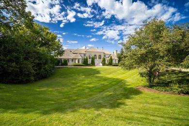Nestled on over an acre of serene, private grounds in - photo 3