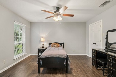 Beautifully situated on a heavily treed one-acre lot in the - photo 23