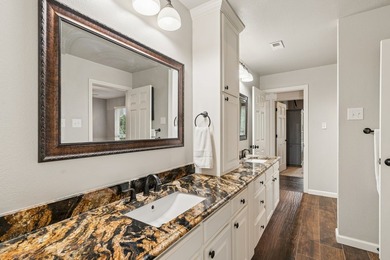 Beautifully situated on a heavily treed one-acre lot in the - photo 24