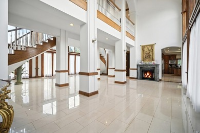 Nestled on over an acre of serene, private grounds in - photo 6