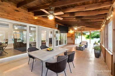 Beautifully situated on a heavily treed one-acre lot in the - photo 26