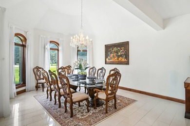 Nestled on over an acre of serene, private grounds in - photo 9