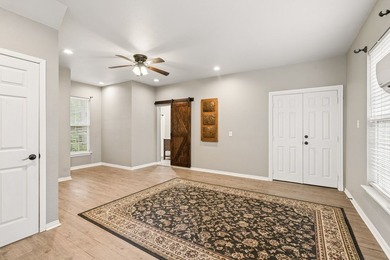 Beautifully situated on a heavily treed one-acre lot in the - photo 30