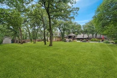 Beautifully situated on a heavily treed one-acre lot in the - photo 34