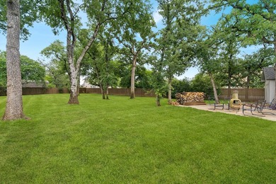 Beautifully situated on a heavily treed one-acre lot in the - photo 37