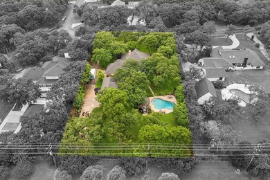 Beautifully situated on a heavily treed one-acre lot in the - photo 39