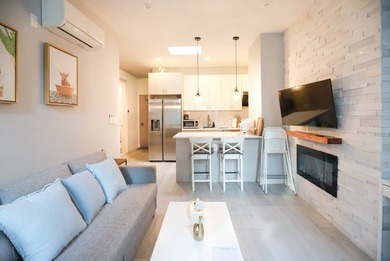 This is 2-Family (Used as 4 Units) + 3 Commercial Units - photo 2