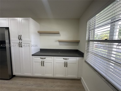 Completely renovated 2BR/1.5BA 1st floor unit with breathtaking - photo 4