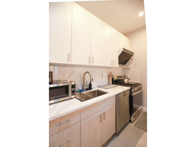 This is 2-Family (Used as 4 Units) + 3 Commercial Units - photo 7