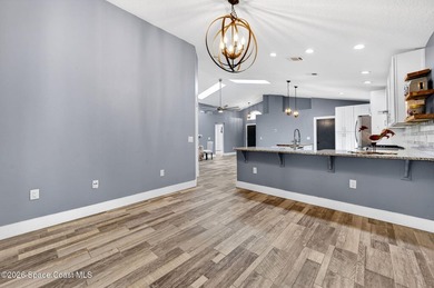 Welcome to this beautifully updated 3-bedroom, 2-bath pool home - photo 18