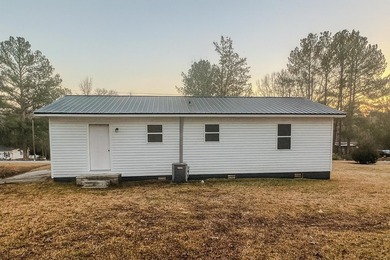 This beautifully renovated home boasts 3 spacious bedrooms and 1 - photo 2