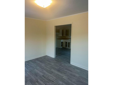 This beautifully renovated home boasts 3 spacious bedrooms and 1 - photo 5