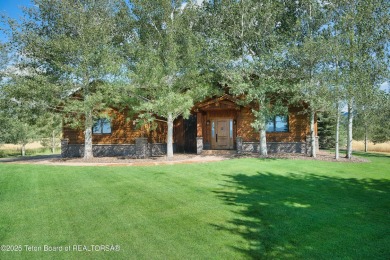 Lake Home For Sale in Victor, Idaho
